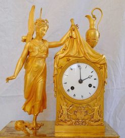 Empire | GSLR Antiques Pendule Empire En Bronze Dore - Le Lever Du Jour